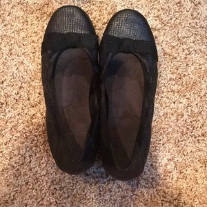 Black ballet flats with bows
